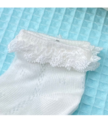 Calcetín Corto Marfil Encaje  Primavera-Verano  Calcetín corto bebé con encaje en tono marfil.