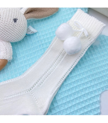 Calcetín Largo Pompones Marfil  Inicio  Calcetín largo bebé calado con adorno de pompones en